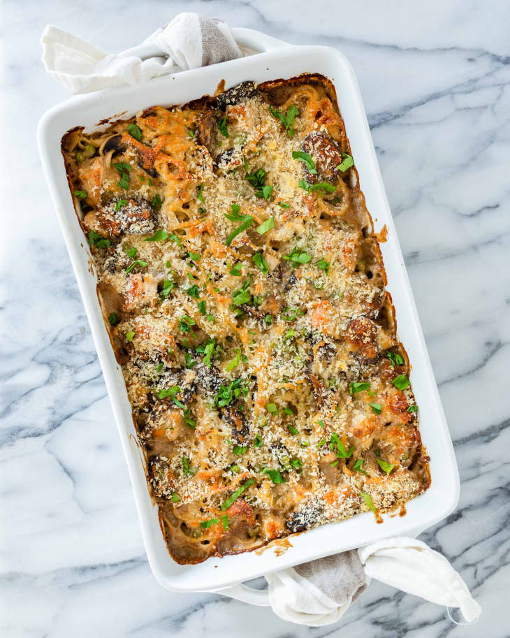 Turkey Tetrazzini in a white serving dish on a marble table