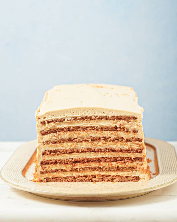 Honey cake (a layered cake with notes of honey and caramel) on a white plate.