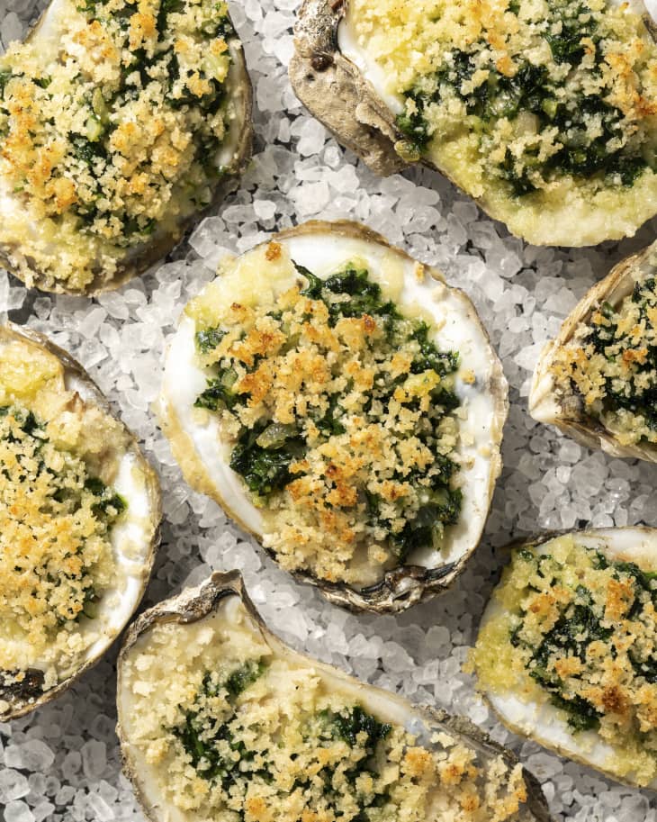 Oysters Rockefeller consists of oysters on the half-shell that have been topped with a rich sauce of butter, parsley and other green herbs, and bread crumbs, then baked or broiled.