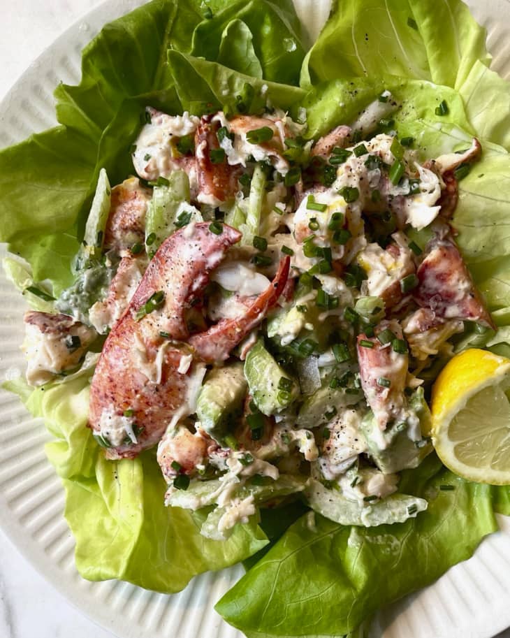 Lobster salad (lobster meat, mayo, lemon and herbs, tossed together) over a bed of butter lettuce leaves.