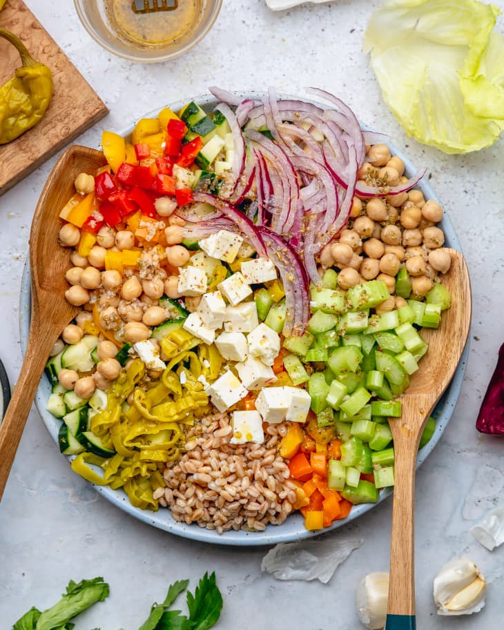 https://cdn.apartmenttherapy.info/image/upload/f_auto,q_auto:eco,c_fill,g_center,w_730,h_913/k%2FPhoto%2FRecipes%2F2019-09-TWV-Chopped-Greek-ish-Salad-with-Farro-and-Oregano-Vinaigrette%2FChopped_Salad_with_Farro_and_Oregano_Vinaigrette3