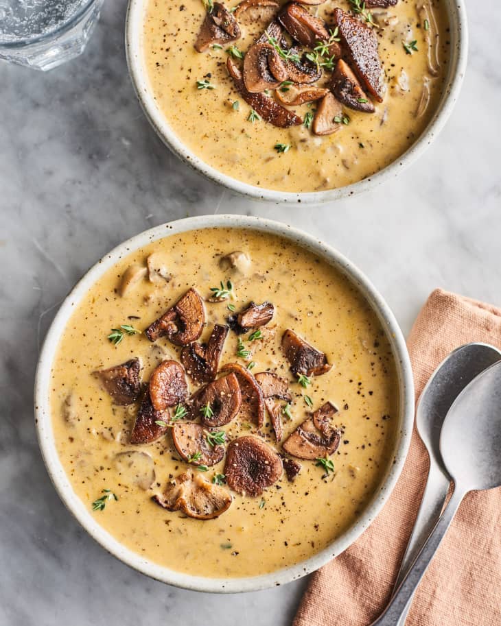 overhead view of 2 bowls of creamy mushroom soup