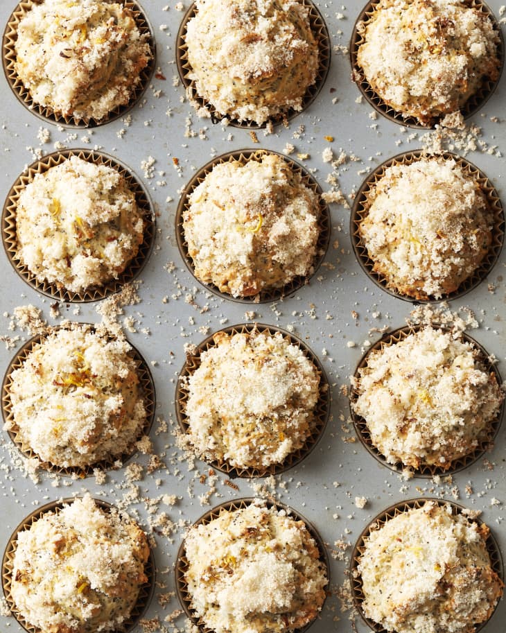 Lemon poppy seed muffins freshly baked in muffin tins.