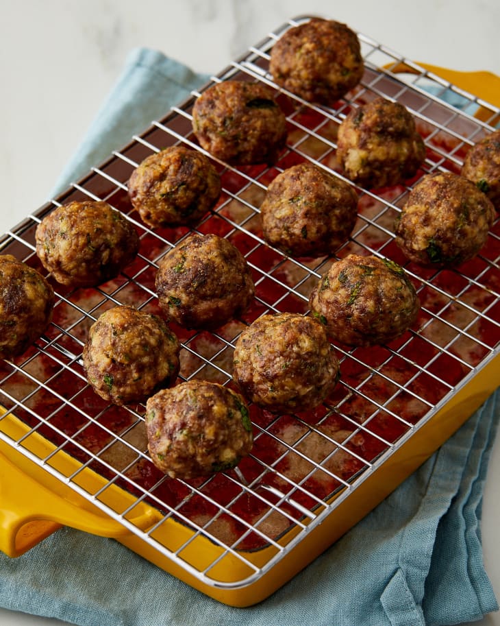 Easy oven baked meatballs on wire rack.