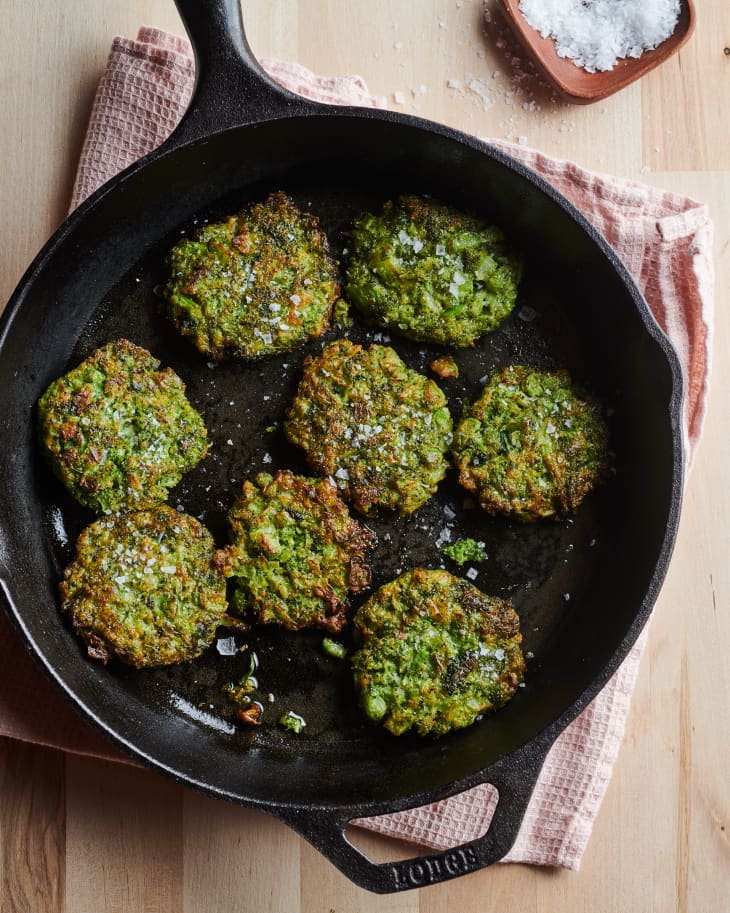 Two ingredient broccoli fritters in skillet.