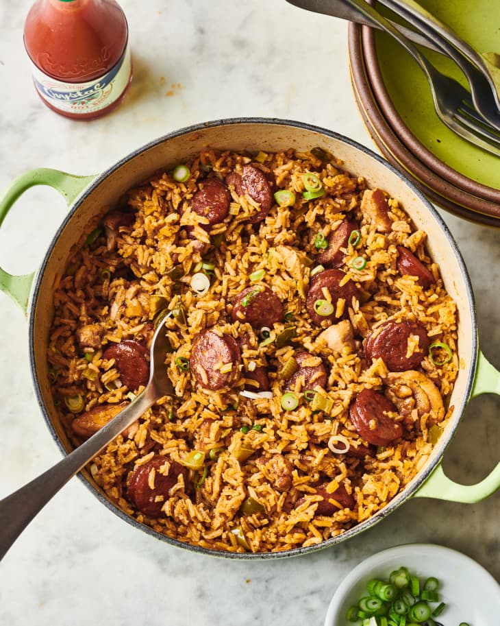 jambalaya in a pot with a metal spoon