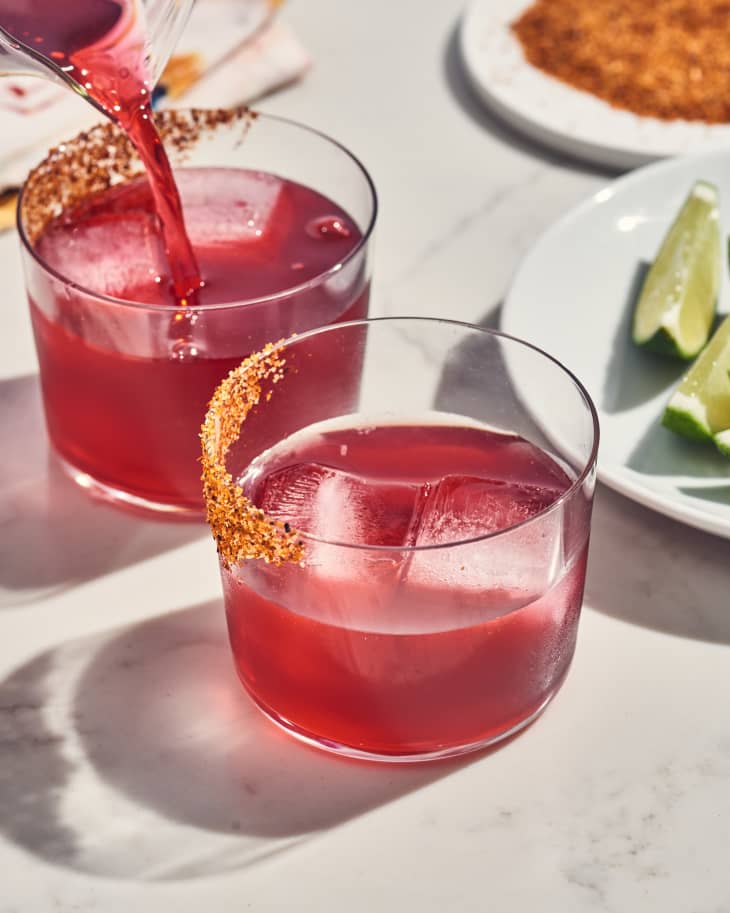 two hibiscus mezcal cocktails on a table
