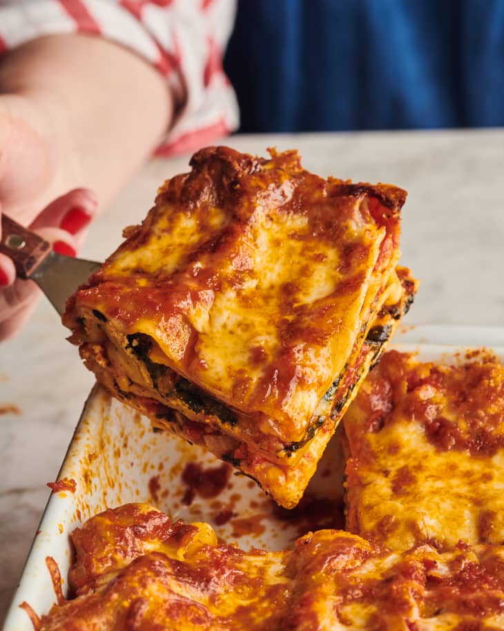 Spinach lasagna on spatula.