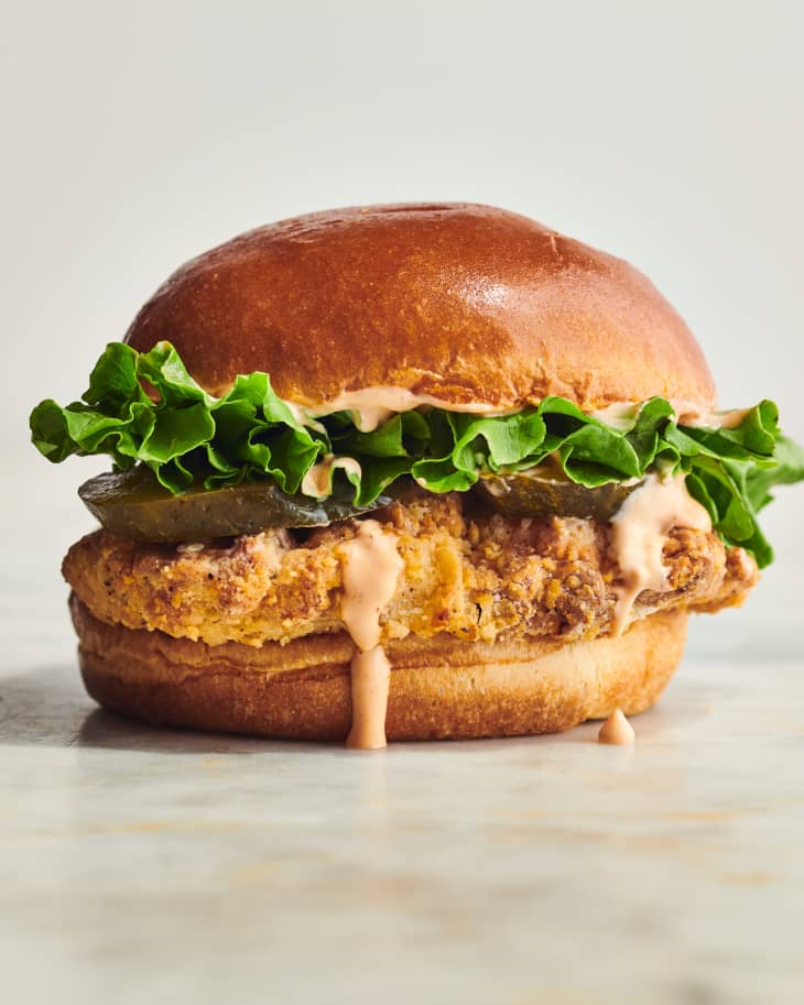 fried chicken on sandwich bun with lettuce
