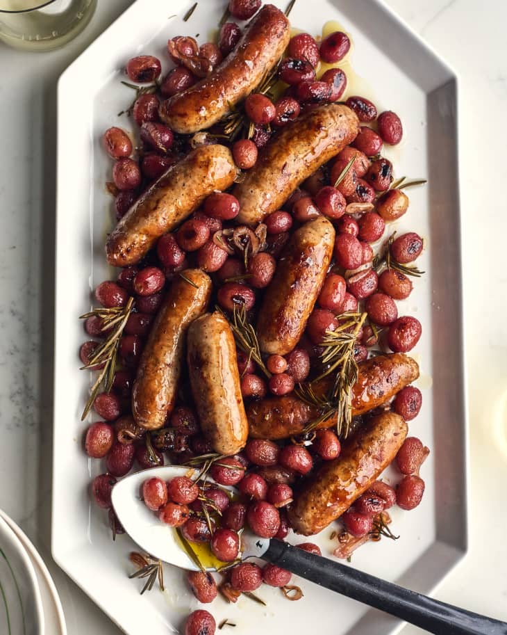 sausage and grapes on a platter