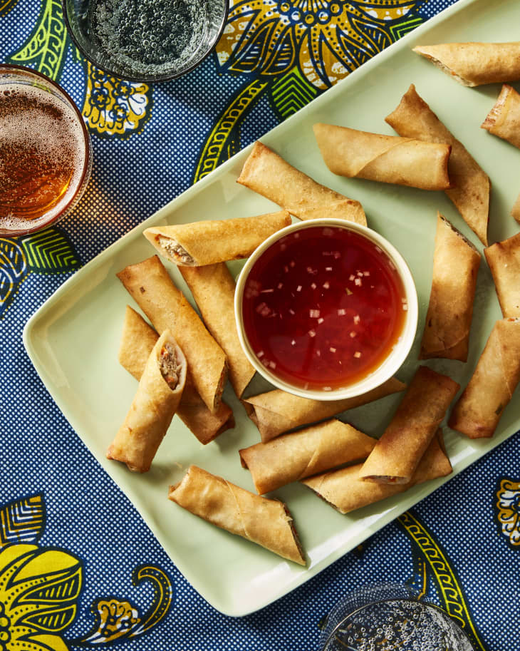 lumpia on plate with sauce