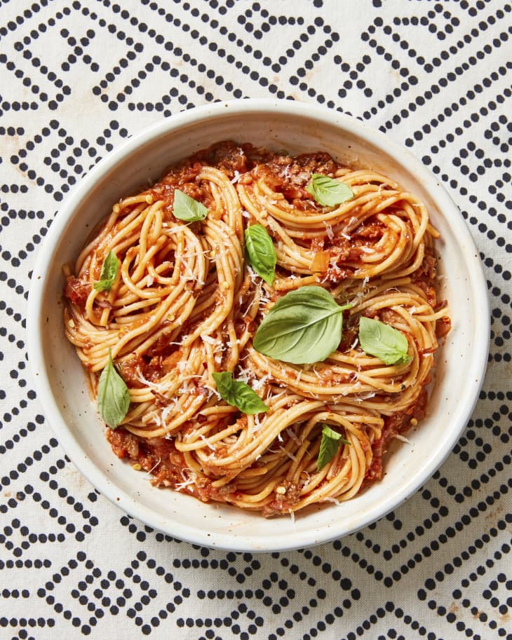 spaghetti with red sauce on a bowl