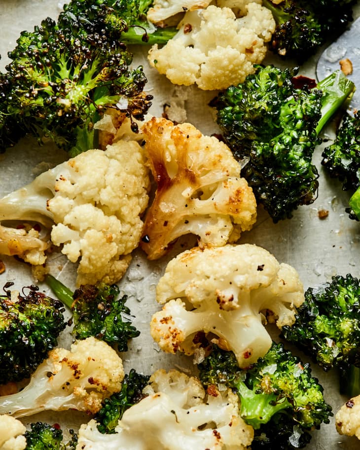 roasted broccoli and cauliflower in a serving bowl