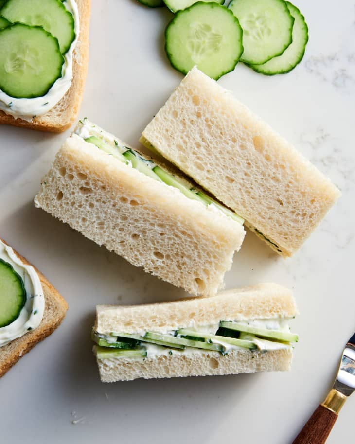 closeup shot of stacked cucumber sandwiches