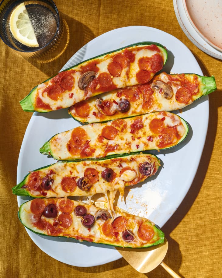 Zucchini pizza boats on platter