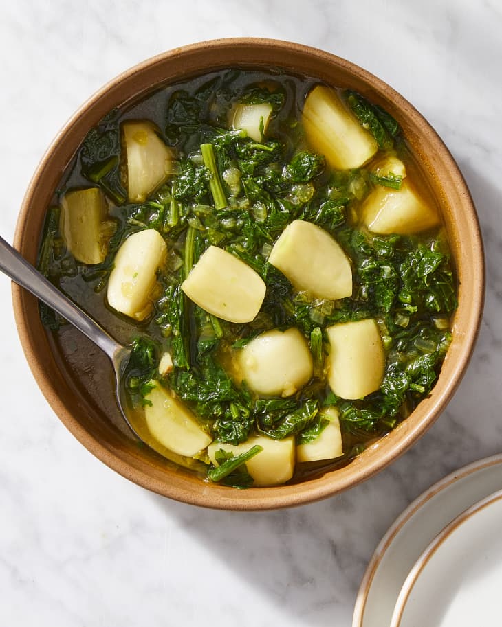 Brothy turnip greens served in bowls.