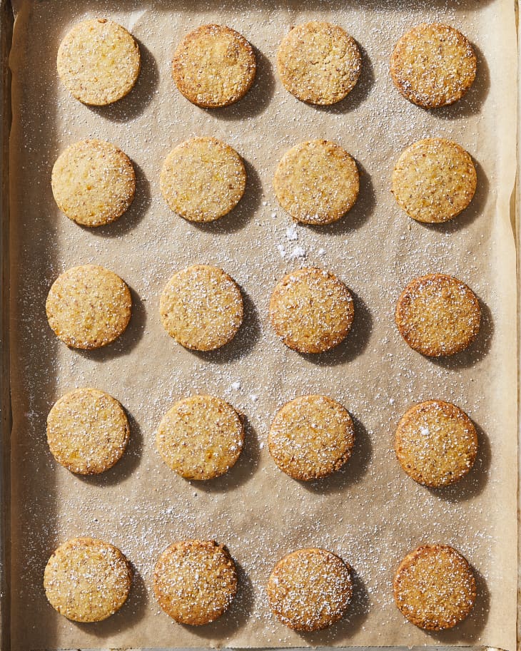 Spiced Almond Polvorone cookies on baking pan.