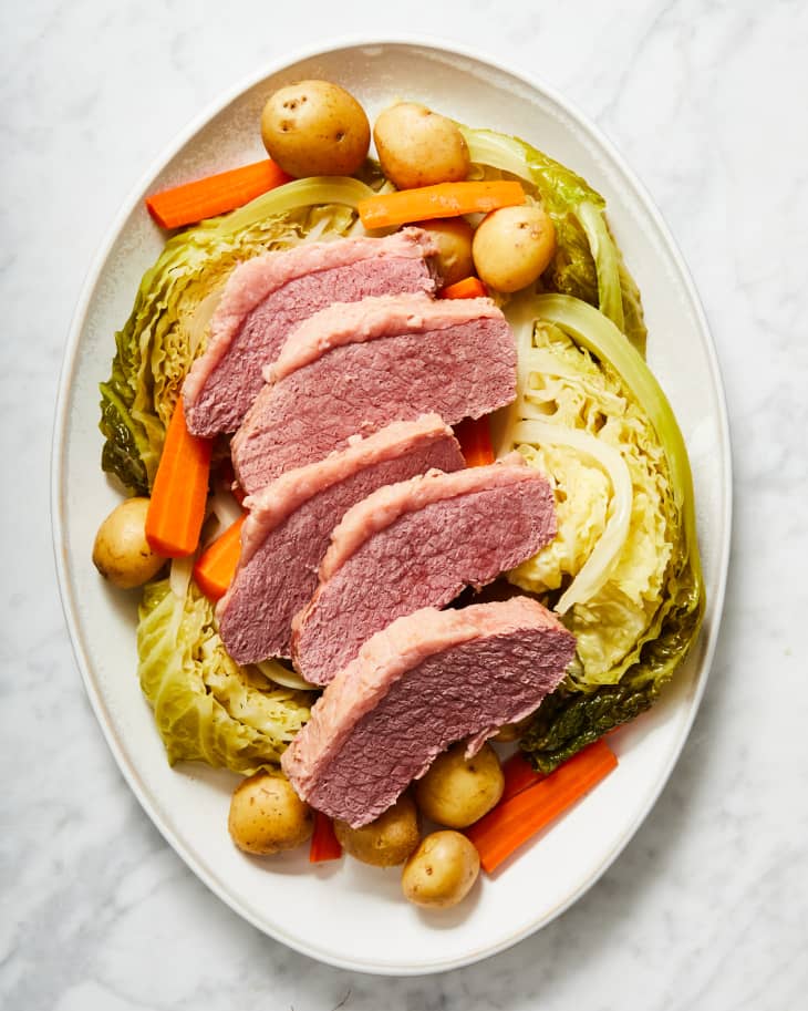 Corned beef and cabbage served on a plate.