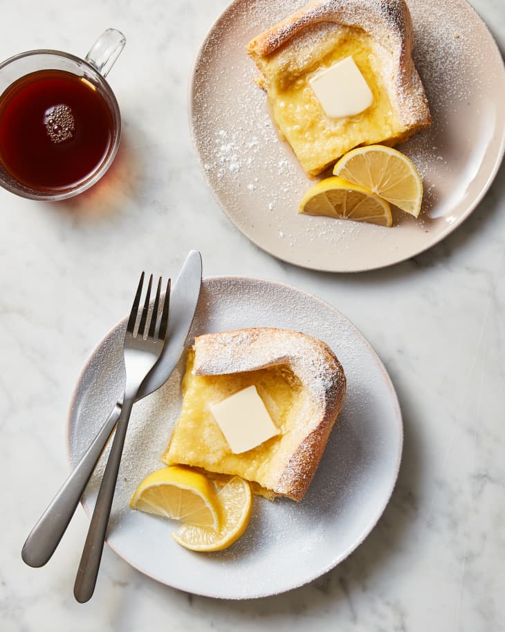 German pancakes on plates with coffee