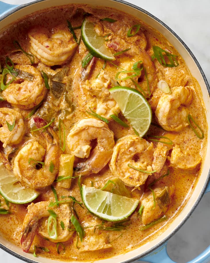 pot of shrimp curry on a white marble surface