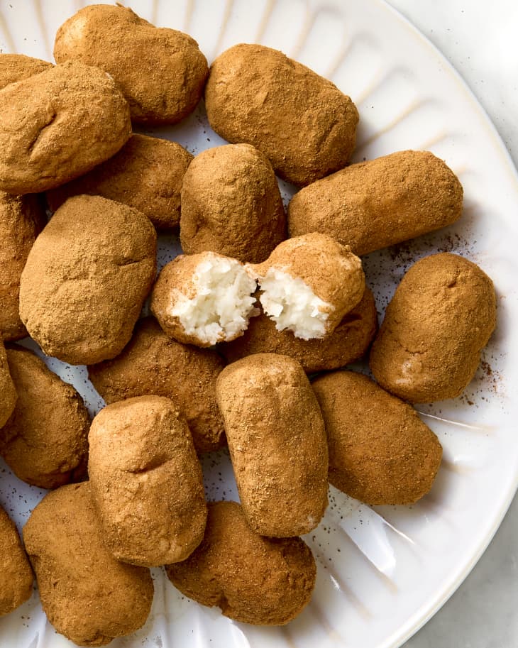 overhead shot of Irish potato candy o a white plate.