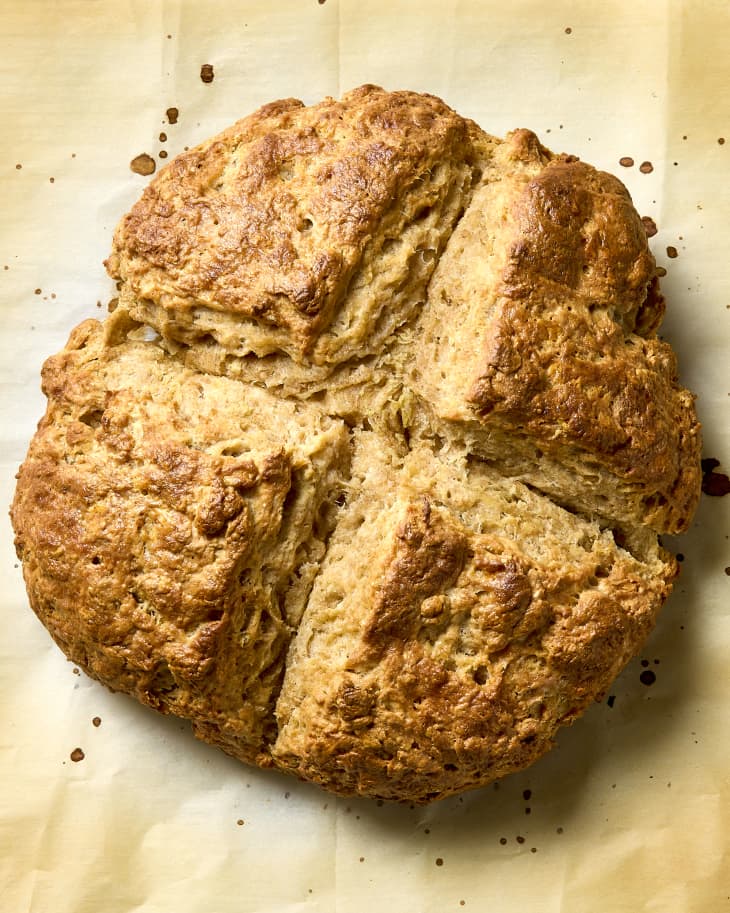 overhead shot of irish soda bread on parchment paper.