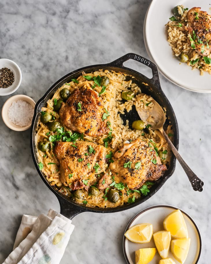 Chicken and rice in a cast iron skillet on counter