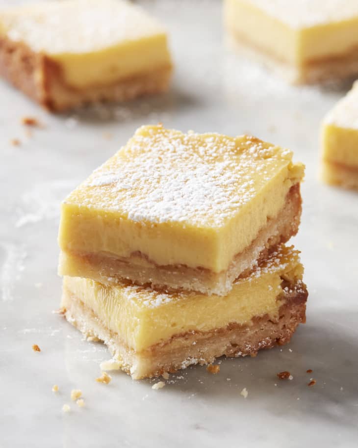 Two lemon bars stacked on top of each other.