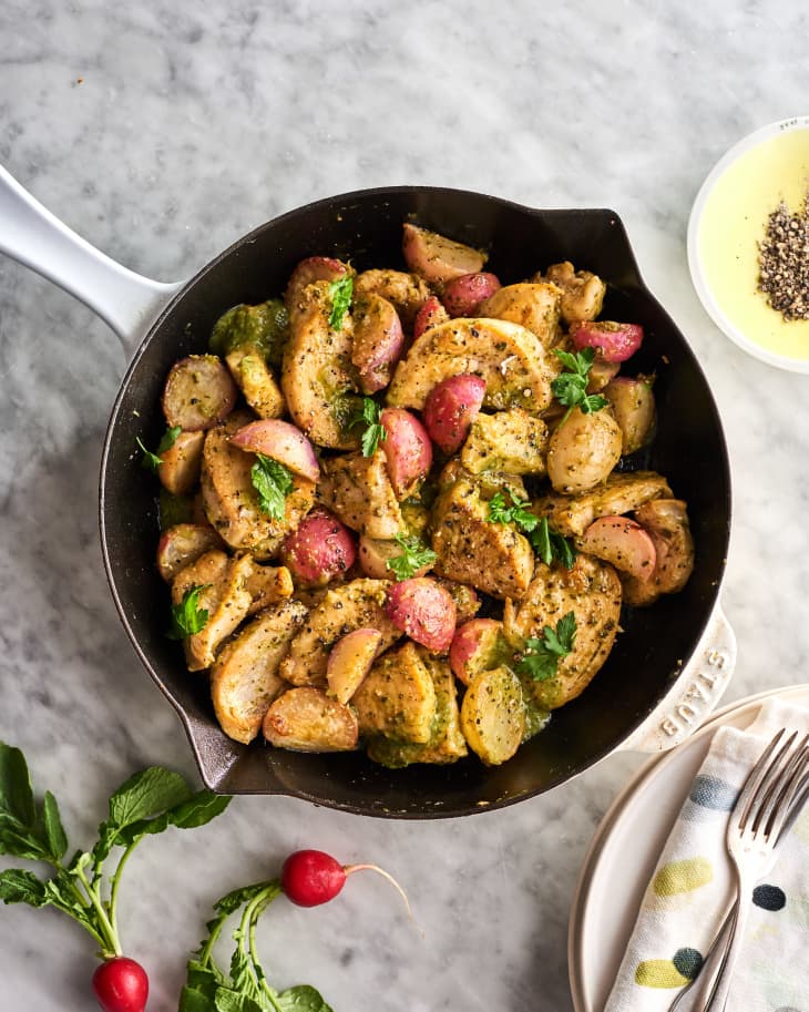 cooked chicken and radishes in a skillet