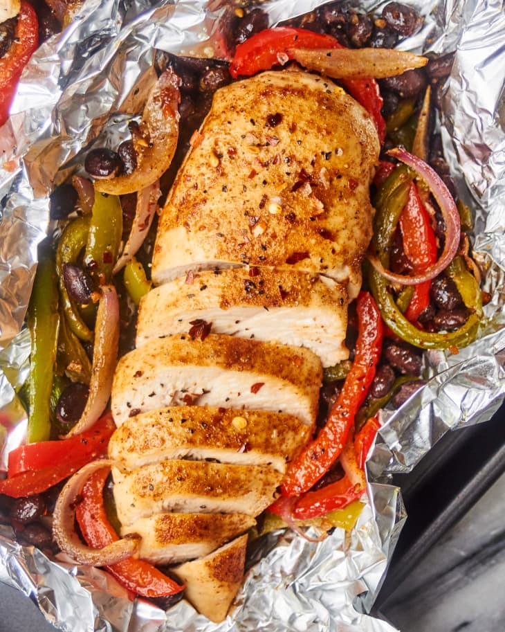 Cooked chicken breast, onion, bell pepper in foil packet