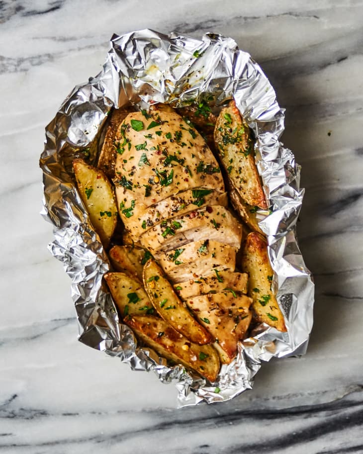 Chicken and potatoes cooked in a foil packet