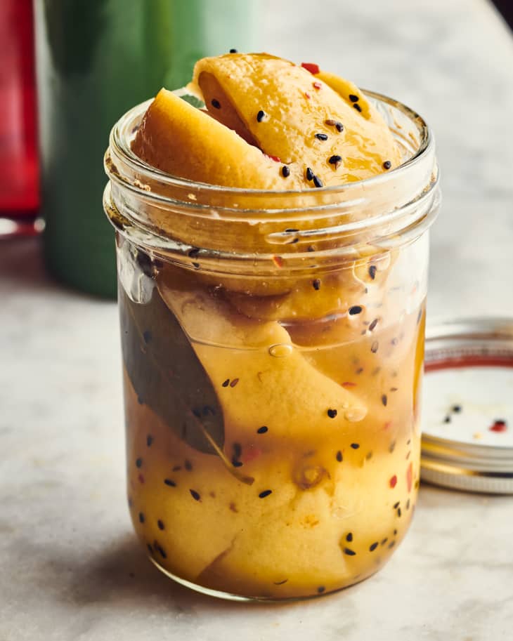 preserved lemons in a mason jar with spices