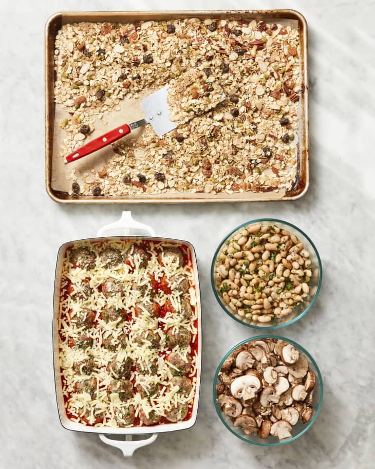 different meals in prep containers and sheet pans