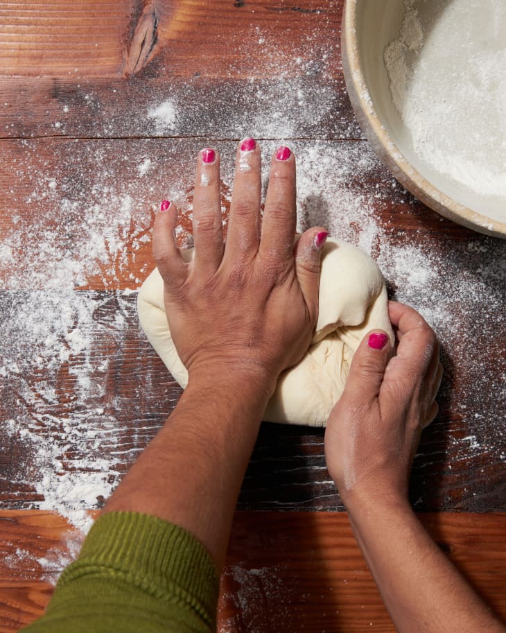 Kneeding dough for Arab bread.