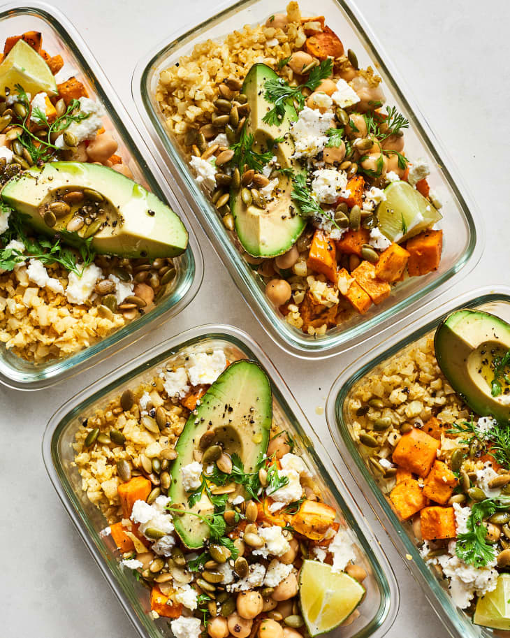 Chickpea and roasted vegetable salads in lunch containers ready to be packed for lunch