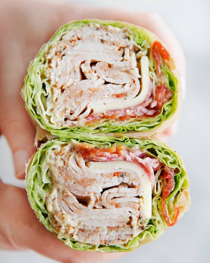 Turkey wraps with lettuce and tomato, cross section view