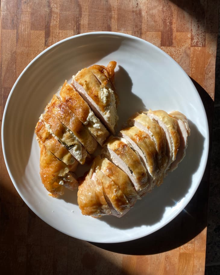 Golden brown chicken breast stuffed with herbed goat cheese