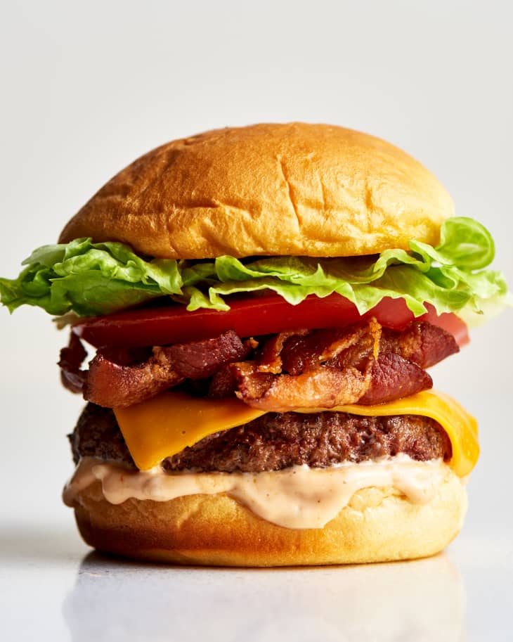 Award-winning burger with juicy patty, bacon, and secret sauce