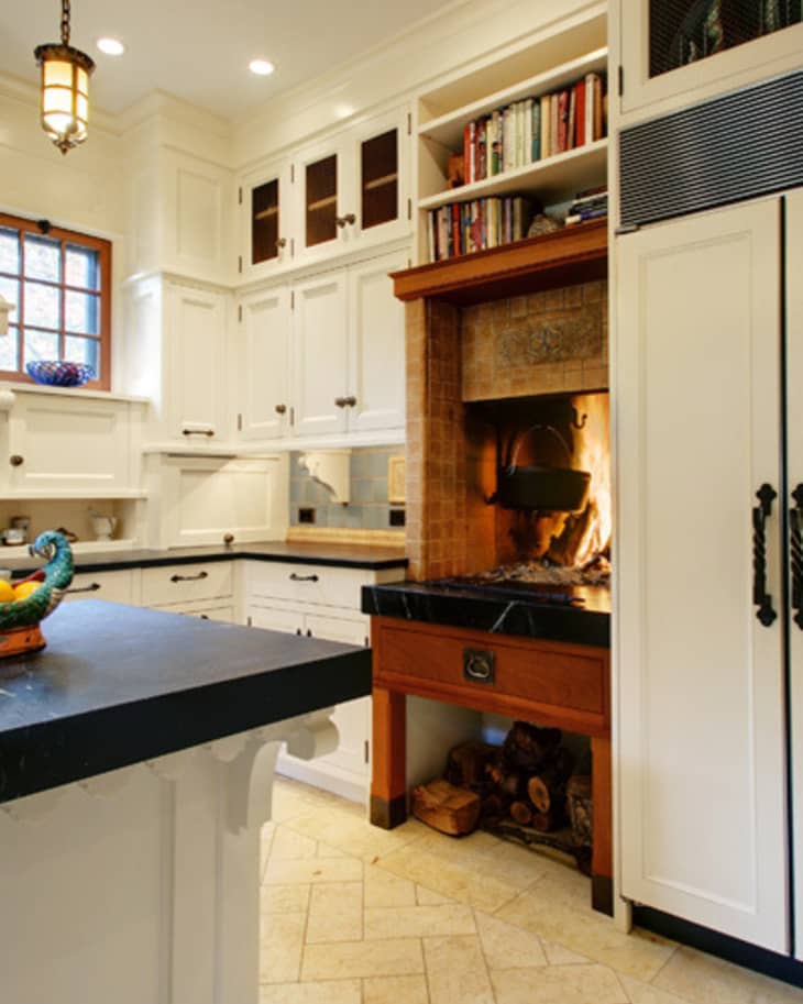 Dream Detail A BuiltIn Wood Fireplace Right In the Kitchen! The Kitchn