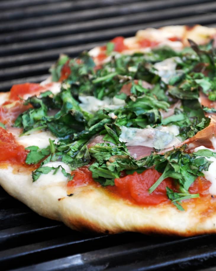 Grilling pizza on charcoal grill hot sale