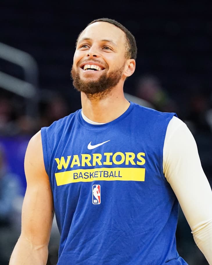 Stephen Curry #30 of the Golden State Warriors warms up before the game against the Philadelphia 76ers at Chase Center on March 24, 2023 in San Francisco, California.