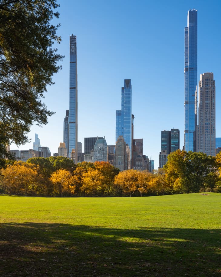 Midtown view of Central Park in Fall with Billionaires' Row supertall skyscrapers from Sheep Meadow. Manhattan, New York City