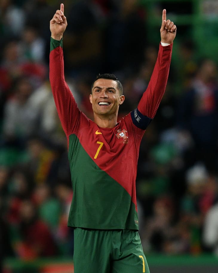 Cristiano Ronaldo of Portugal celebrates after Joao Cancelo of Portugal scores their sides first goal during the UEFA EURO 2024 qualifying round group J match between Portugal and Liechtenstein at Estadio Jose Alvalade on March 23, 2023 in Lisbon, Portugal.