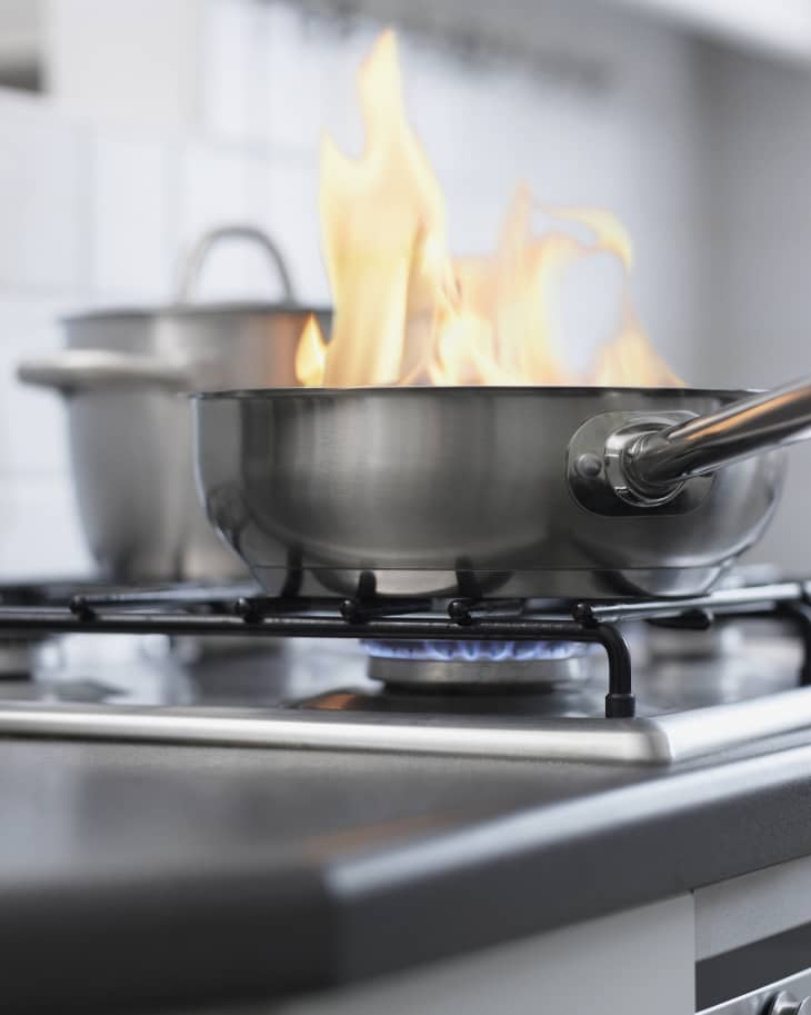 Food burning in pan on stove - kitchen fire