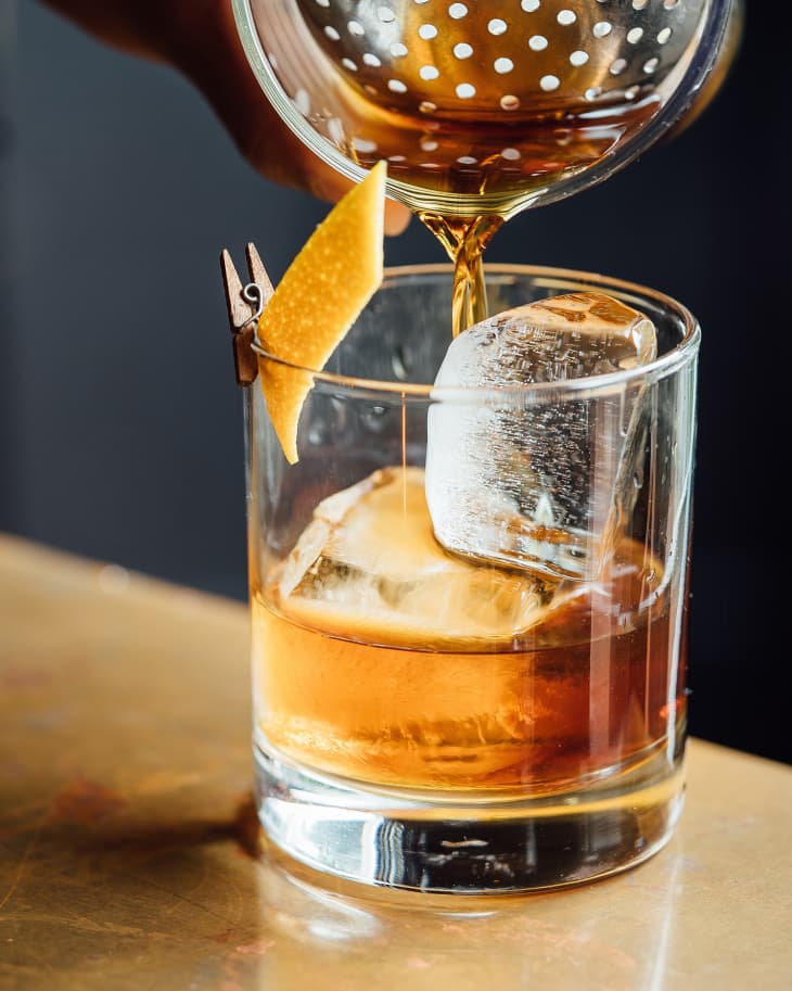 Closeup Glass with Alcohol in Cocktail Bar