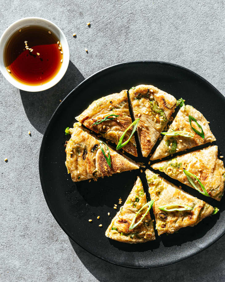 Sliced green onion pancakes with dipping sauce