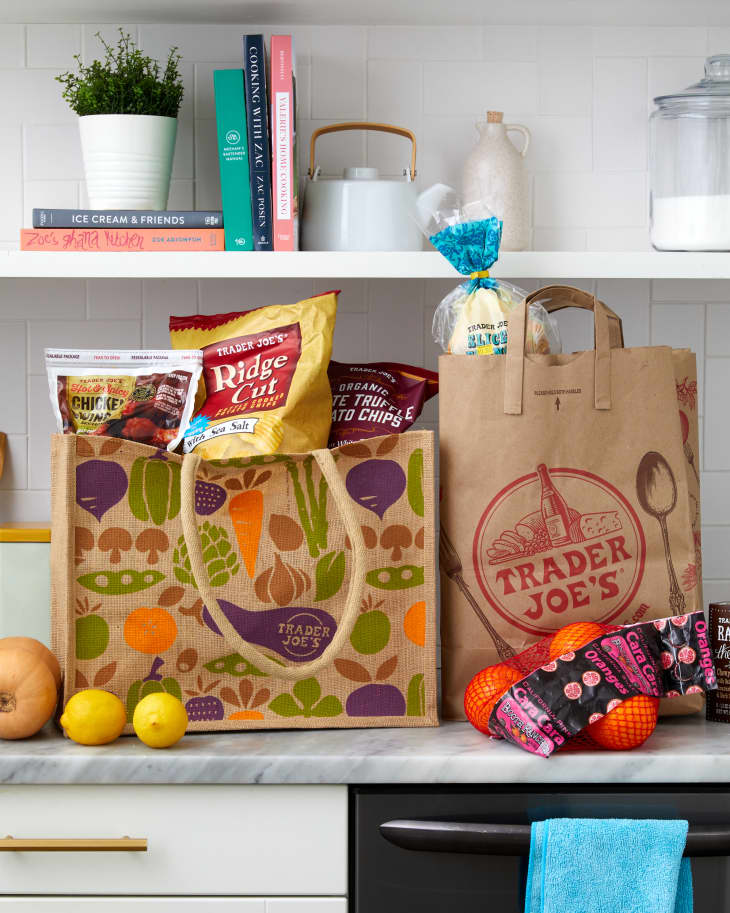 trader joes bag with goods on kitchen counter