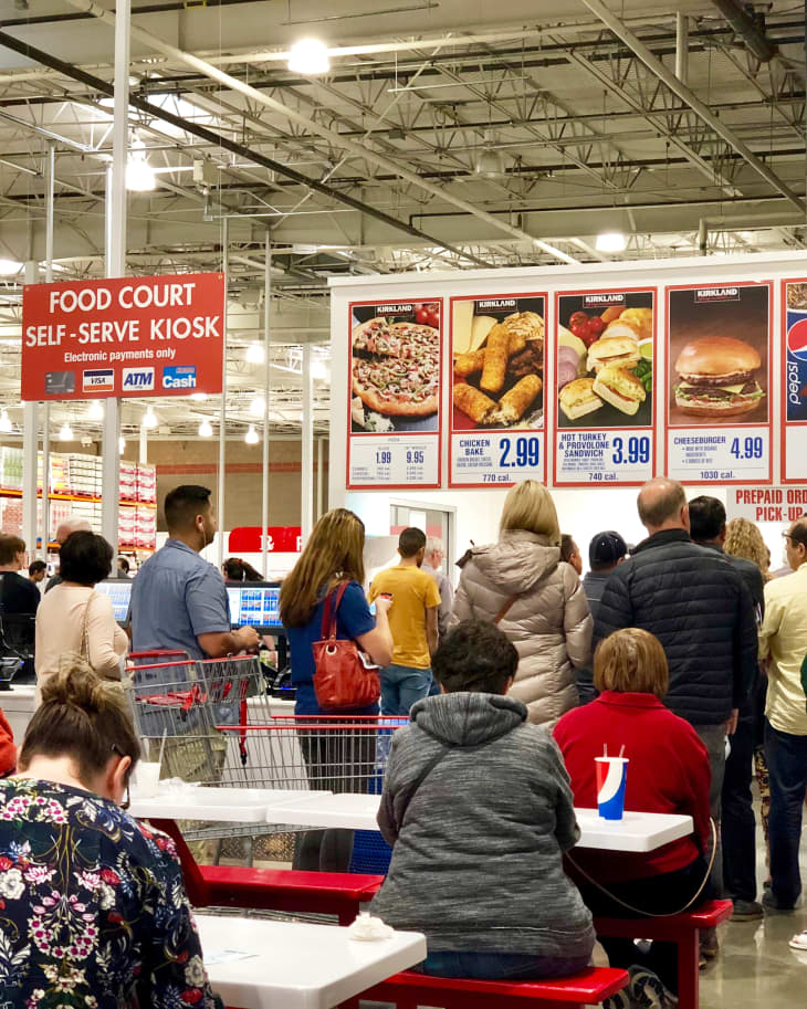 FOLSOM, CA, USA - OCT 8, 2018: Costco food court by the new self serve kiosk full of customers .