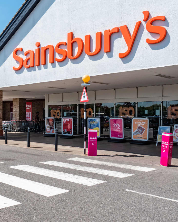 EASTBOURNE, UK - 3 JUNE 2019: Sainsbury's Supermarket, Eastbourne, England. The entrance to a branch of the UK supermarket chain, Sainsburys, on a bright sunny day.