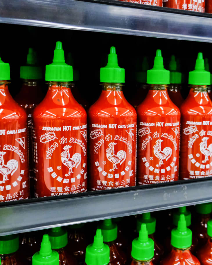 Los Angeles, CA/USA 08/21/2019 Plastic bottles of Huy Fong Food Sriracha hot chili sauce in a supermarket aisle